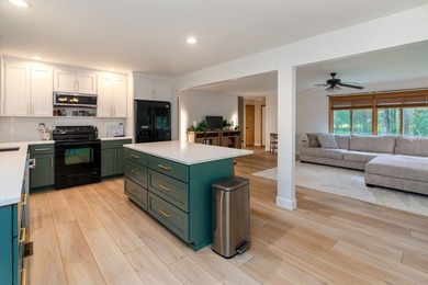 Tucked away on a peaceful one-acre wooded lot, this 4-bedroom, 3 - photo 10