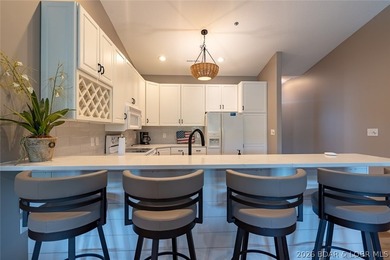 This top-floor Lazy Days condo shows like brand new and is being - photo 12