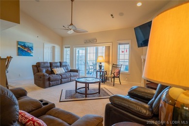 Elevate your Lake lifestyle in this premier Top Floor residence