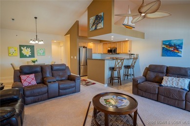 Elevate your Lake lifestyle in this premier Top Floor residence