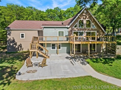 EXTREMELY MOTIVATED SELLER. Nearly flat lakefront yard, acreage - photo 1