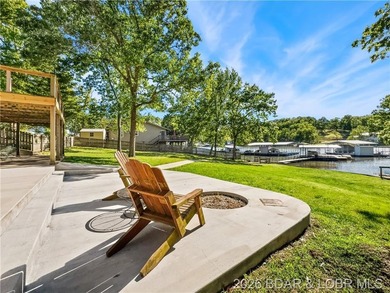 EXTREMELY MOTIVATED SELLER. Nearly flat lakefront yard, acreage - photo 2