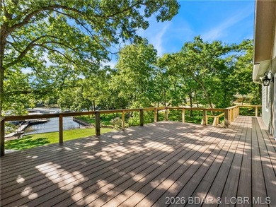 EXTREMELY MOTIVATED SELLER. Nearly flat lakefront yard, acreage - photo 6