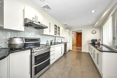 Stunning expanded ranch in the exclusive Lake Success sits on - photo 8
