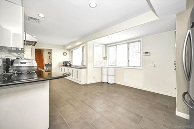 Stunning expanded ranch in the exclusive Lake Success sits on - photo 10