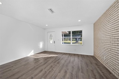 TOTALLY RENOVATED! NEW metal roof. NEW custom kitchen. NEW AC - photo 7