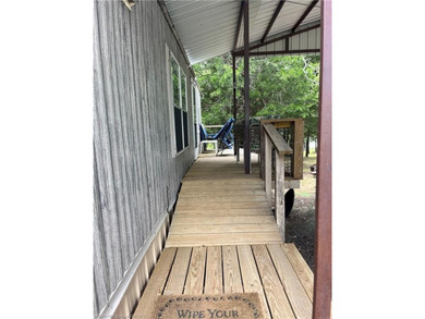 Welcome to your lake retreat in Stigler, Oklahoma. This - photo 3