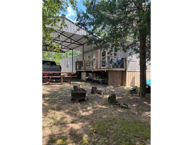 Welcome to your lake retreat in Stigler, Oklahoma. This - photo 7