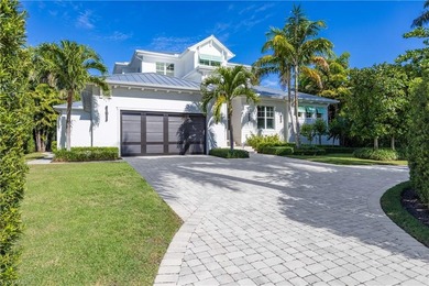 THIS TURNKEY FURNISHED HOME BOAST A .56 ACRE LOT. This Manicured - photo 1
