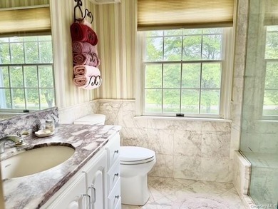 Nestled in the heart of the North Fork, this beautiful 4-bedroom - photo 16