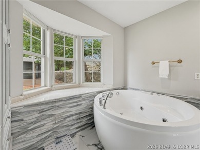 Perched on a bluff in the heart of Osage Beach, this one-owner - photo 18