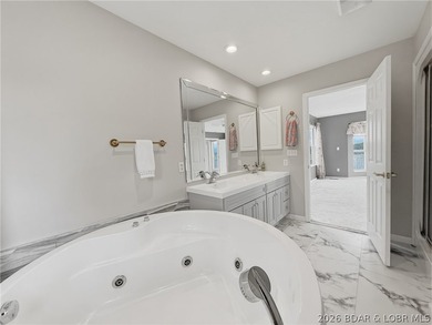 Perched on a bluff in the heart of Osage Beach, this one-owner - photo 19