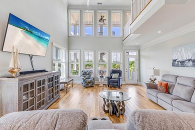 Experience the very best of coastal waterfront living along the - photo 8