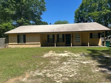 Lake Home For Sale in Carriere, Mississippi