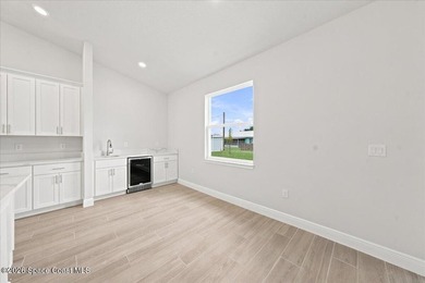 Experience the ultimate Florida living in this brand-new custom - photo 11