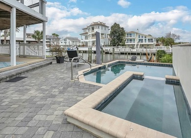 Waterfront luxury meets effortless coastal living--this is the - photo 12