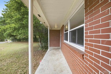 Welcome home to this charming all-brick ranch nestled on a quiet - photo 3