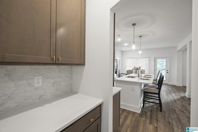 MODEL HOME NOT FOR SALE. The Rosemary III on a lake lot! You'll - photo 6