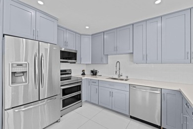 Discover this beautifully maintained 4-bedroom, 2-bathroom - photo 12