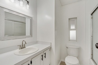 Beautifully fully remodeled double-wide mobile home in a highly - photo 14