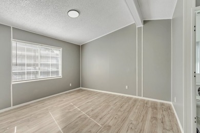 Beautifully fully remodeled double-wide mobile home in a highly - photo 15
