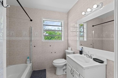 Discover this beautifully maintained 4-bedroom, 2-bathroom - photo 18