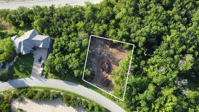 Discover the epitome of lakeside living in this stunning cleared - photo 2
