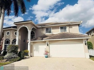 Lake Home For Sale in Coral Springs, Florida