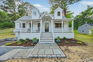 Nestled on one of Stamford's most desirable streets in one of - photo 1