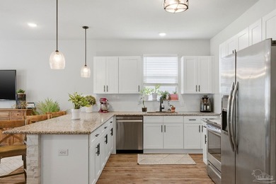 Welcome home to this beautiful end unit townhome in the gated - photo 6