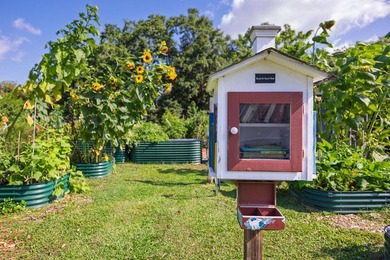 Welcome to 1056 Keats Road, a charming brick home nestled in the - photo 38