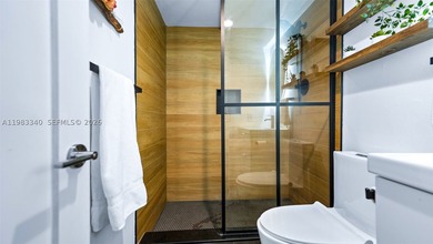 Breathtaking water views from the moment you walk in. This fully - photo 4