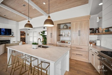 Experience waterfront living at 27701 E Beach Blvd, a Gold - photo 32