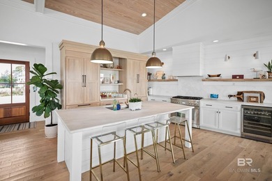 Experience waterfront living at 27701 E Beach Blvd, a Gold - photo 34