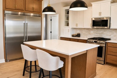 Custom designed two-story residence featuring a walk-out - photo 10