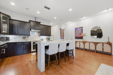 Welcome to this exceptional mid-century modern-inspired