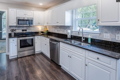 Meticulously maintained and full of timeless charm, this - photo 15