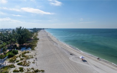 Experience true beachfront living in this stunning corner-unit - photo 15