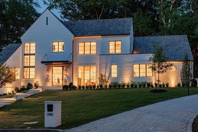 Tucked away on a private corner along a tree-lined cul-de-sac - photo 1