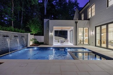 Tucked away on a private corner along a tree-lined cul-de-sac - photo 2