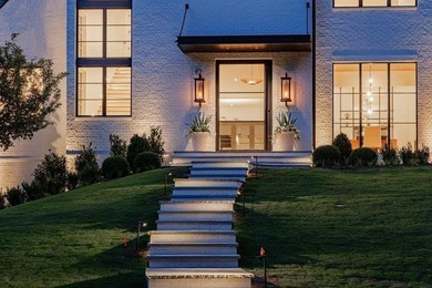 Tucked away on a private corner along a tree-lined cul-de-sac - photo 3