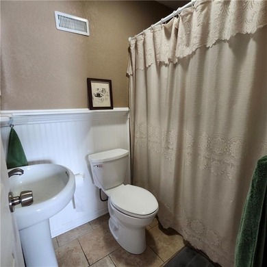 Well-maintained ranch home situated on a desirable corner lot