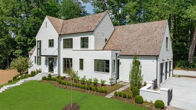 Tucked away on a private corner along a tree-lined cul-de-sac - photo 8