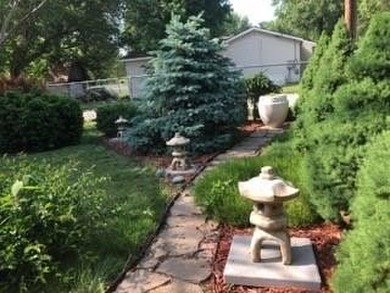 Well-maintained ranch home situated on a desirable corner lot