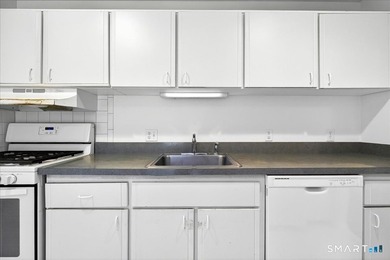 Move-In Ready End Unit! Welcome home to this bright and inviting - photo 4