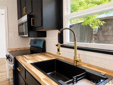 Welcome to this beautifully renovated 3-bedroom, 2-bath home - photo 11