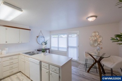 Well maintained, single level townhome in sought after