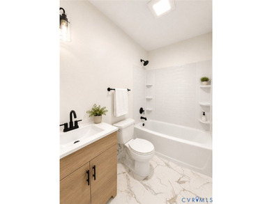 Welcome to this beautifully renovated 3-bedroom, 2-bath home - photo 15