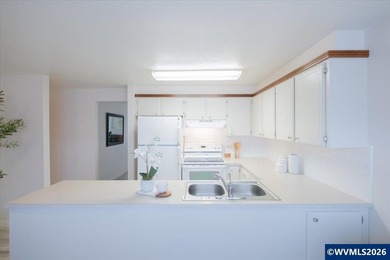 Well maintained, single level townhome in sought after