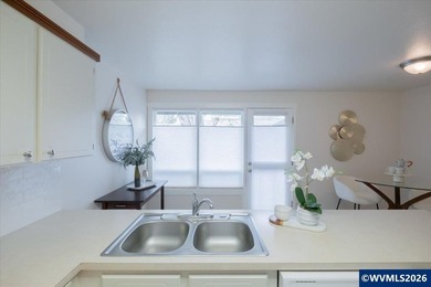 Well maintained, single level townhome in sought after